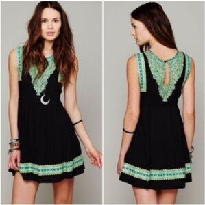 Free People 12 Lexi black drop waist mini dress with blue green border print
